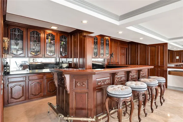 Lower Level - Bar & Game Room area with Covered Patio Access!