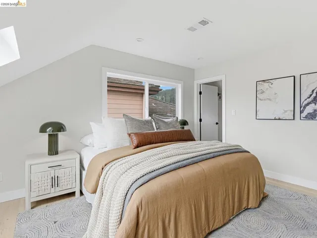 Bedroom featuring baseboards and light wood-style flooring