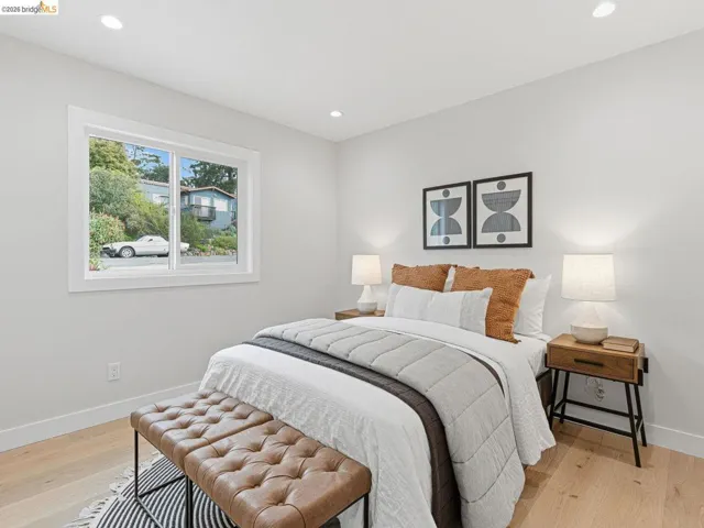 Bedroom featuring light wood-style floors and recessed lighting