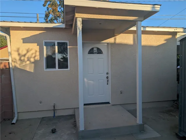 Private entry with step to porch