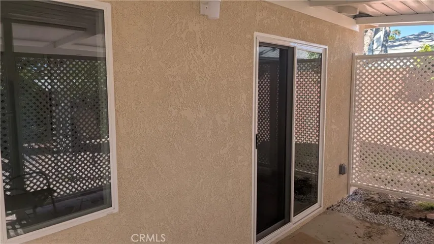 Sliding window to patio from bedroom