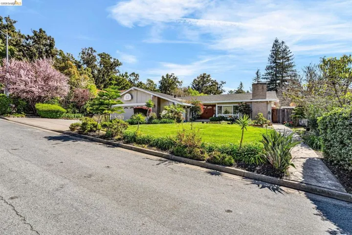 View of front of house featuring a chimney