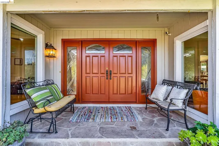 Entrance to property with a porch