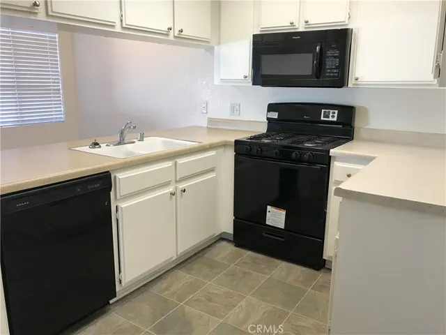 Unit 15, photo taken in 2018, currently tenant occupied and condition will differ.