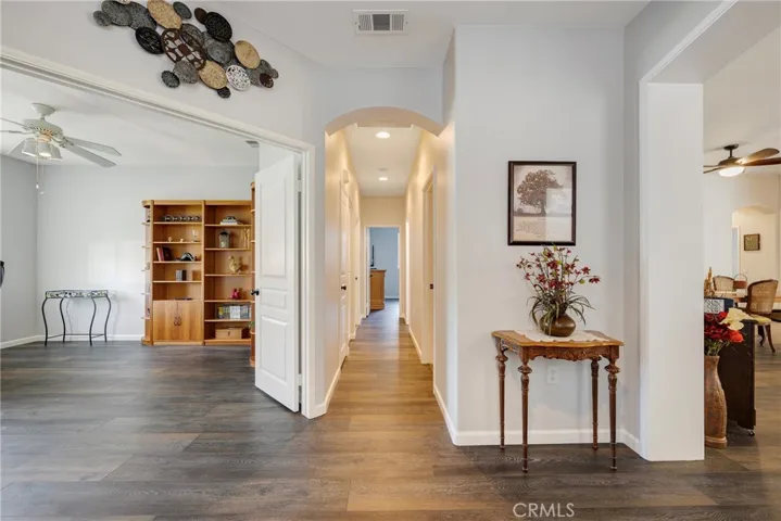 Hallway to 2 additional Bedrooms, Guest Bathroom, Laundry Room and Garage Entry