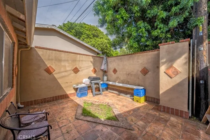 private patio behind guest unit