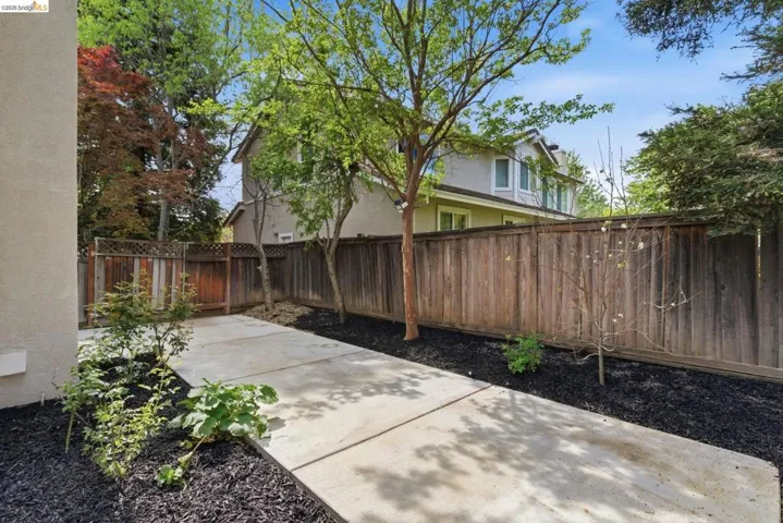 View of fenced backyard