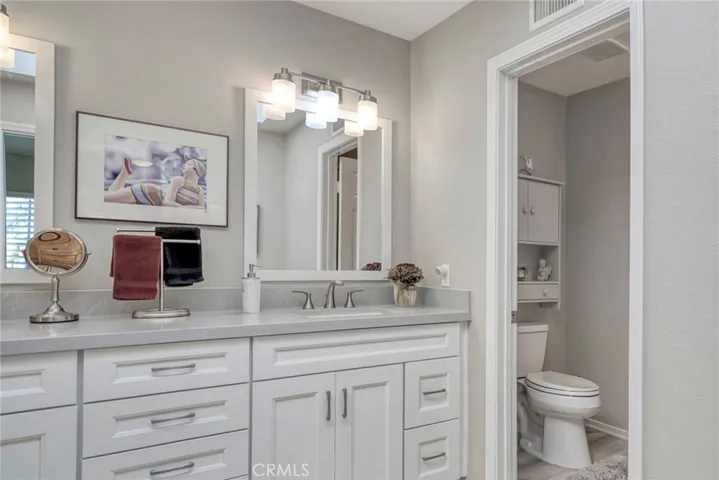 Water closet in Master bath with a walk-in shower
