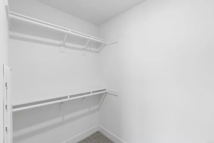 PRIMARY BEDROOM WALK IN CLOSET