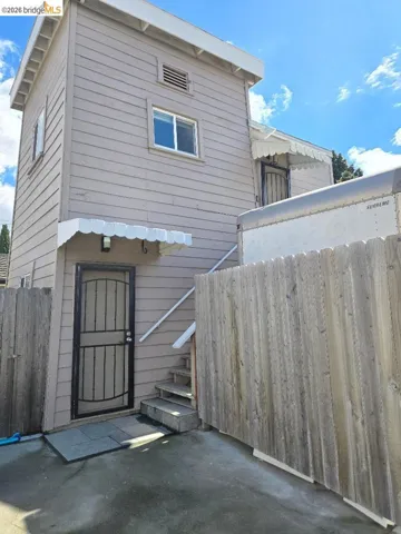 Back of property with a patio area