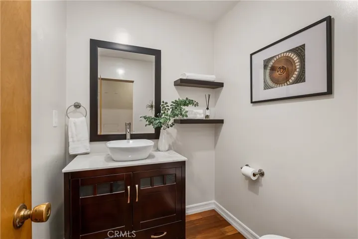 POWDER ROOM ADJACENT TO GARAGE DOOR