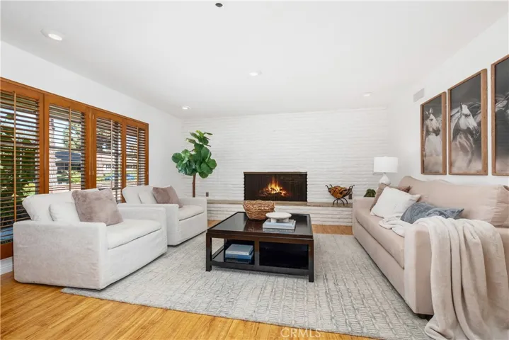 DIFFERENT VIEW OF FORMAL LIVING ROOM.