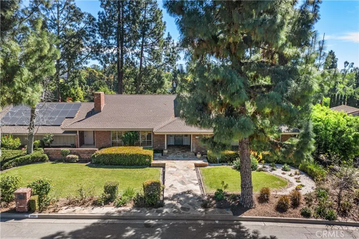 AERIAL VIEW OF THE FRONT OF THE PROPERTY! VERY BALANCED CURB APPEAL!