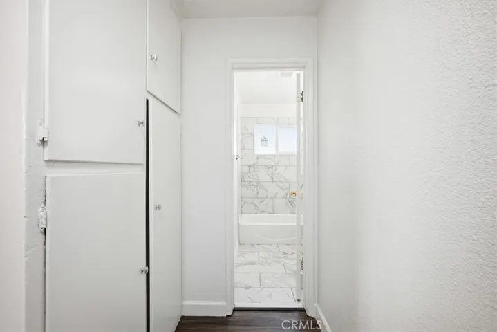 Linen Closet and Entrance to Full Bathroom