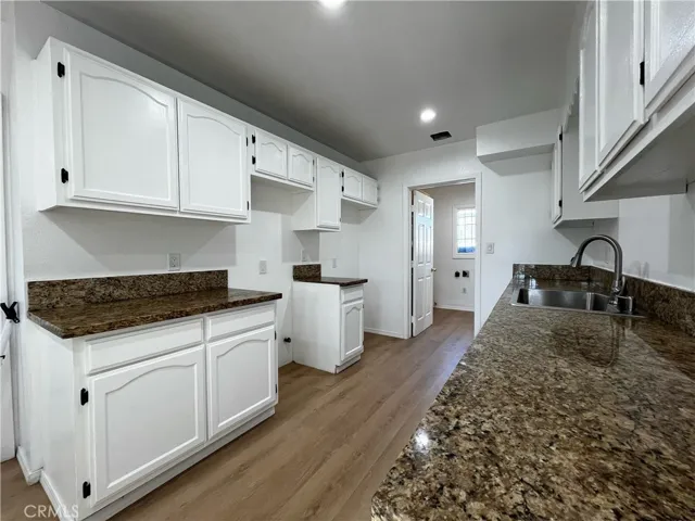 Kitchen with laundry room access