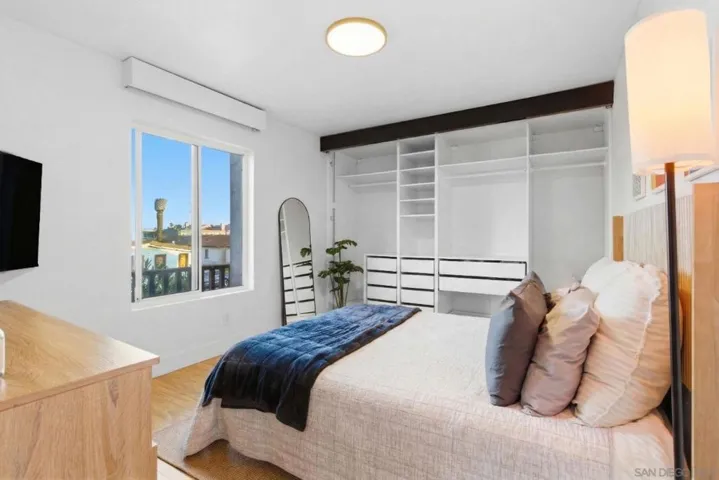 Spacious Bedroom, Remote Window Curtain & Large Closet with Remote Curtain