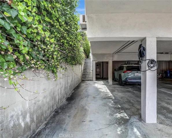 Tandem parking (two spaces) with private Tesla EV charger