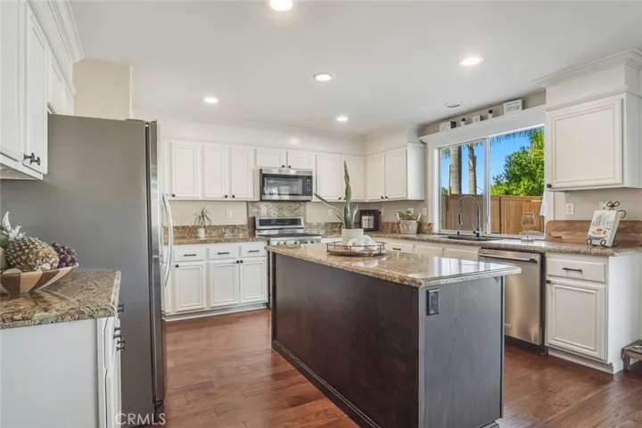 The space space truly delivers. Imagine preparing meals here with room for everything. Spreading out ingredients, hosting helping hands around the island and never feeling crowded.