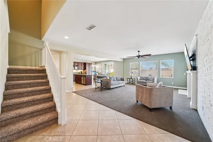 Bright family room -  staircase access to the upstairs bedroom and full bathroom