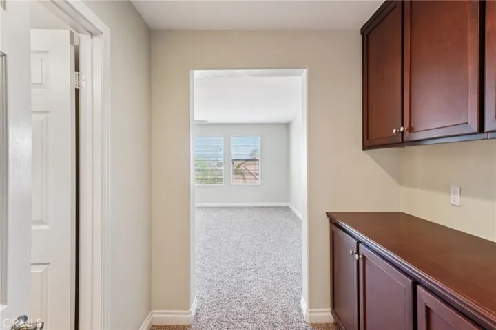 Flexible upstairs living space with bedroom, bathroom, and storage