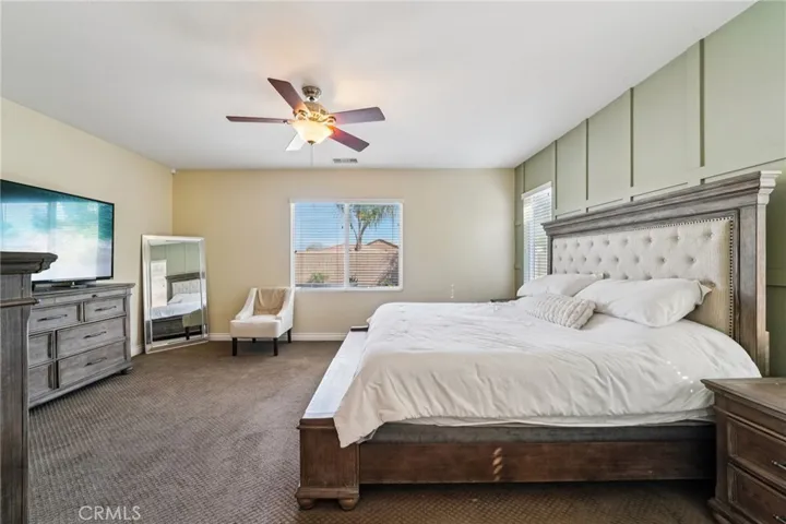 Spacious primary bedroom retreat with plenty of natural light
