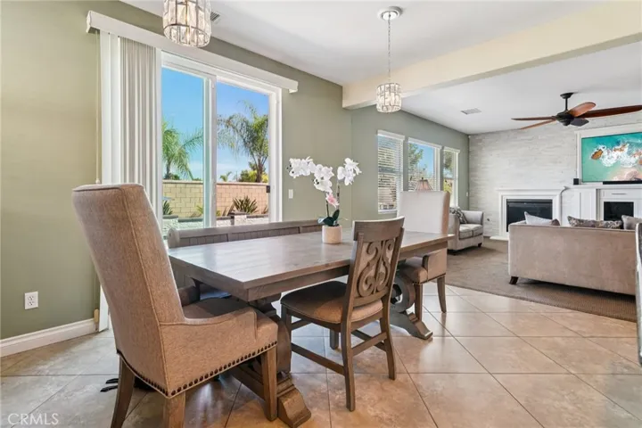 Bright breakfast dining area with designer lighting