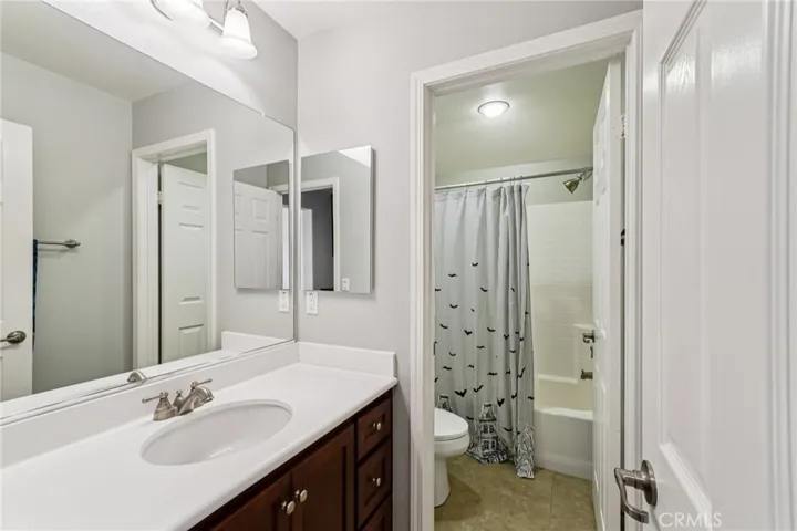 Versatile upstairs suite with bathroom and extra storage space