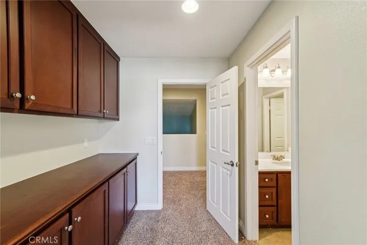 Versatile upstairs suite with bathroom and extra storage space