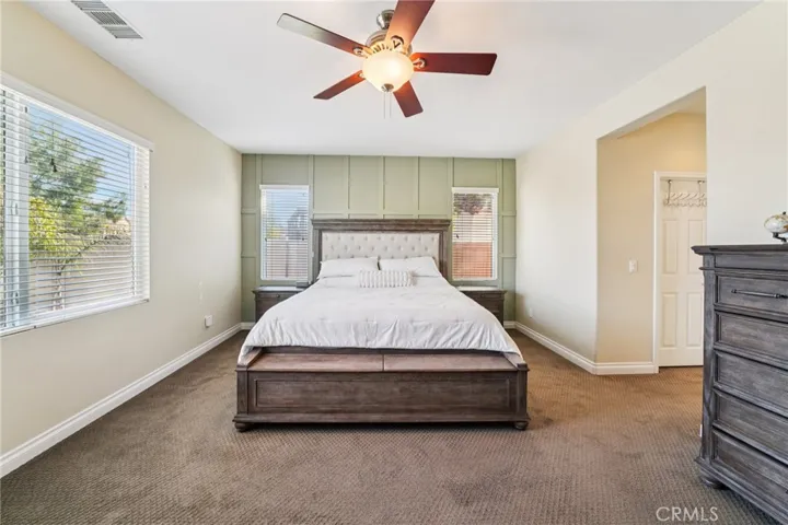 Spacious primary bedroom retreat with plenty of natural light
