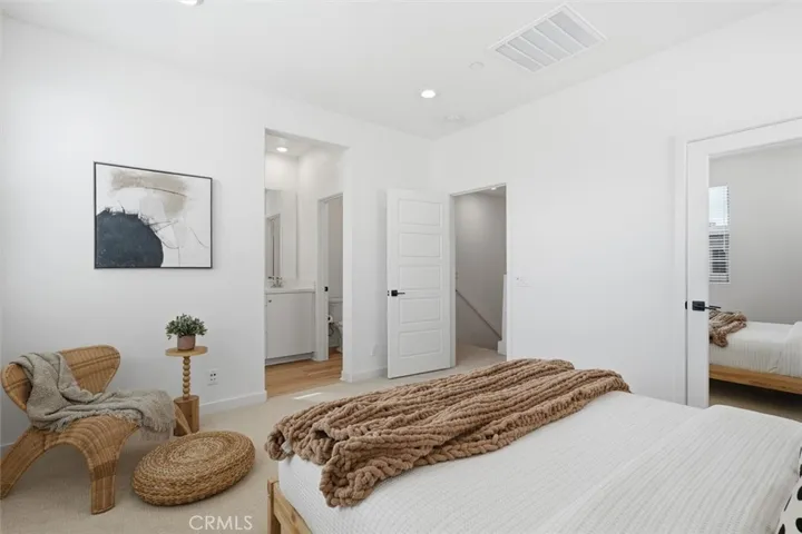 Primary bedroom with mirrored closet