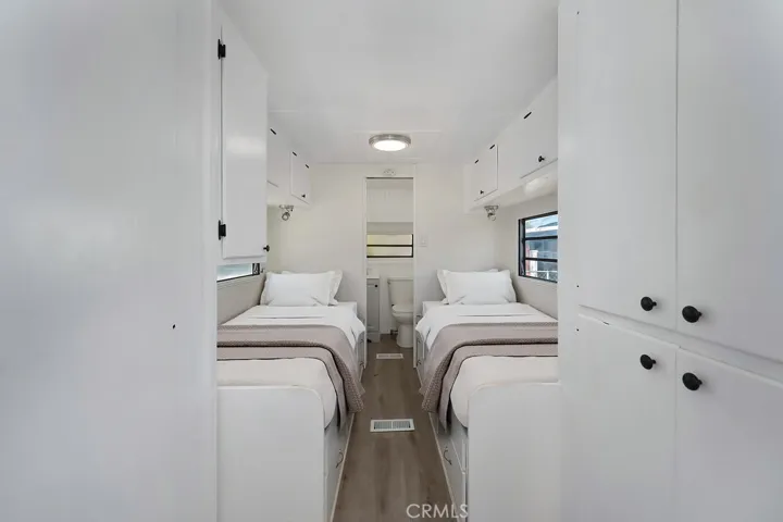 Please note that the image shown is a virtually staged representation of the room and is intended to provide a visual concept of the space. The actual room may differ in appearance, and the furniture and decor depicted are not included in the sale. For an accurate understanding of the property's current condition and layout, we encourage you to view the home in person. Thank you