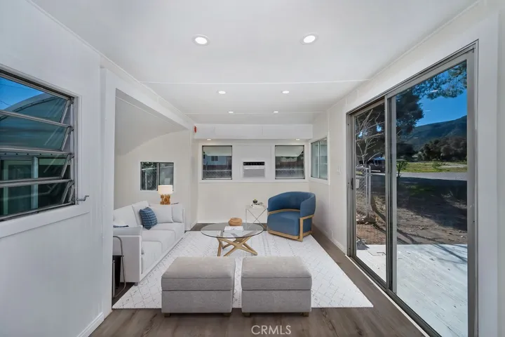 Please note that the image shown is a virtually staged representation of the room and is intended to provide a visual concept of the space. The actual room may differ in appearance, and the furniture and decor depicted are not included in the sale. For an accurate understanding of the property's current condition and layout, we encourage you to view the home in person. Thank you