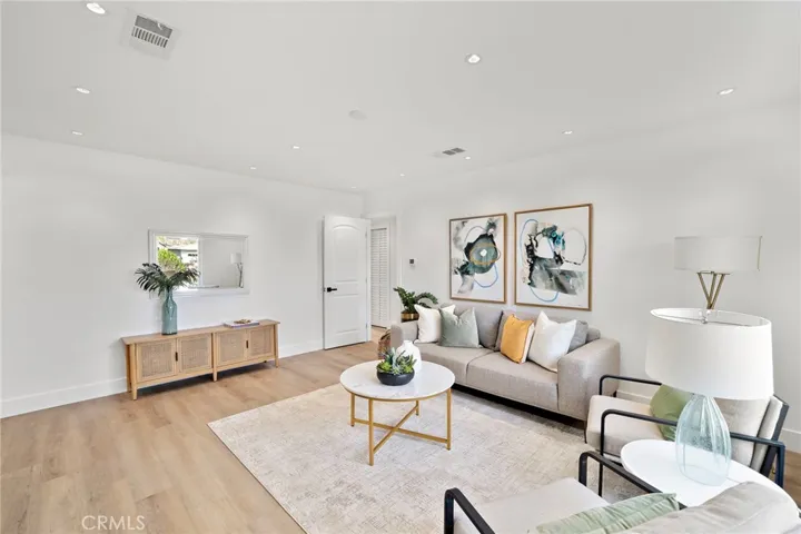 offers approximately 1,200 square feet including an expanded living areas (not permitted) and is located on a quiet cul-de-sac in a pride-of-ownership neighborhood.