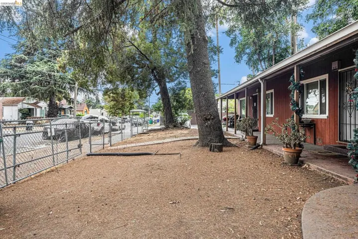 View of yard featuring a porch