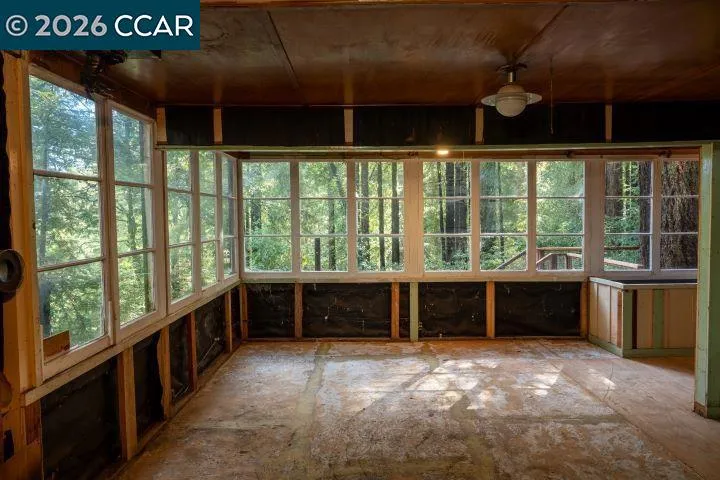 living room with views of forest