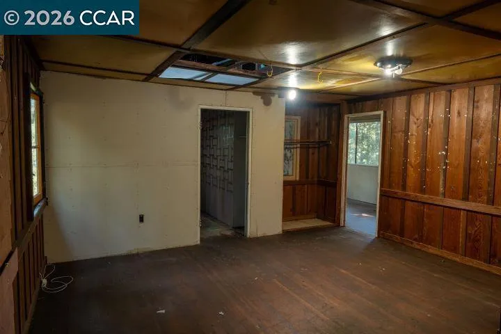upstairs living are with 3 adjacent rooms