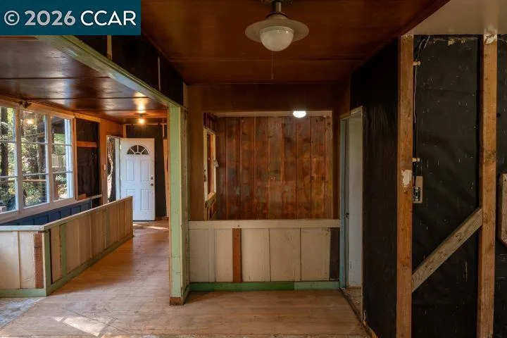 View from living area to front door entry