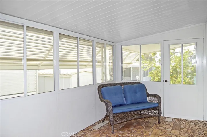 Approx. 128 sq ft bonus room with custom tile flooring offers additional living space