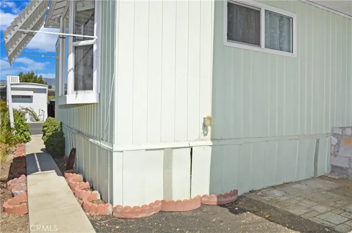 Pathway at back to covered yard space at the back corner