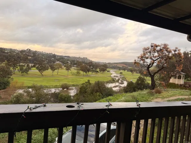 Step out of your living room to a wood deck facing West.., breathtaking view of the Golf course.