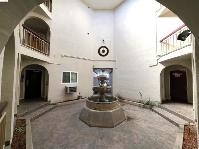 Patio / terrace with a wall mounted air conditioner