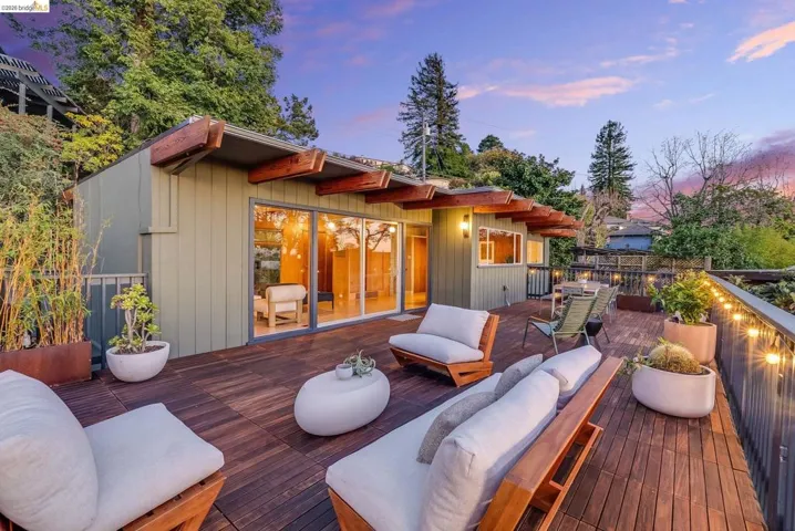 Deck at dusk with an outdoor lounge area