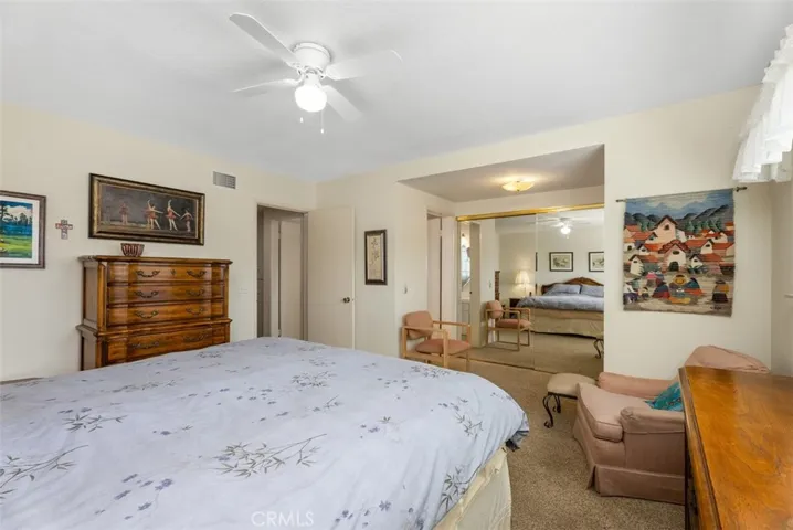 Main bedroom view toward closets and bath