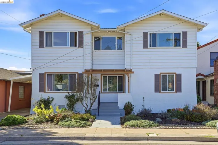Traditional-style home featuring entry steps