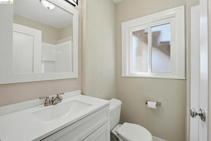 Bathroom with vanity and toilet