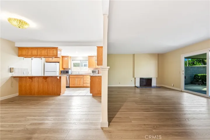 Dining area next to living room. Fireplace is decoration only.