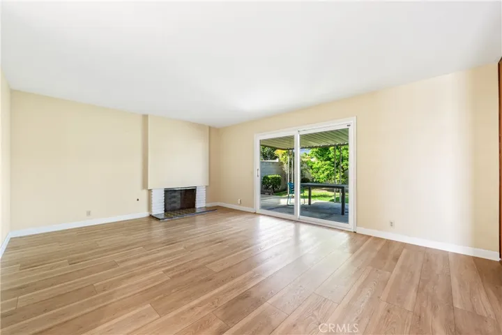 Living room w/ slider to backyard.