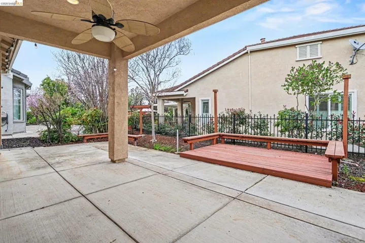 View of patio / terrace featuring a ceiling fan and a wooden deck