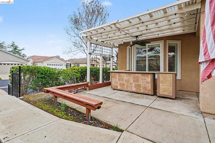 View of patio / terrace with a pergola and a ceiling fan