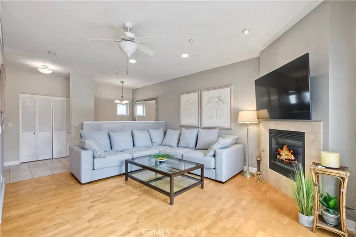 Spacious living area with fireplace.